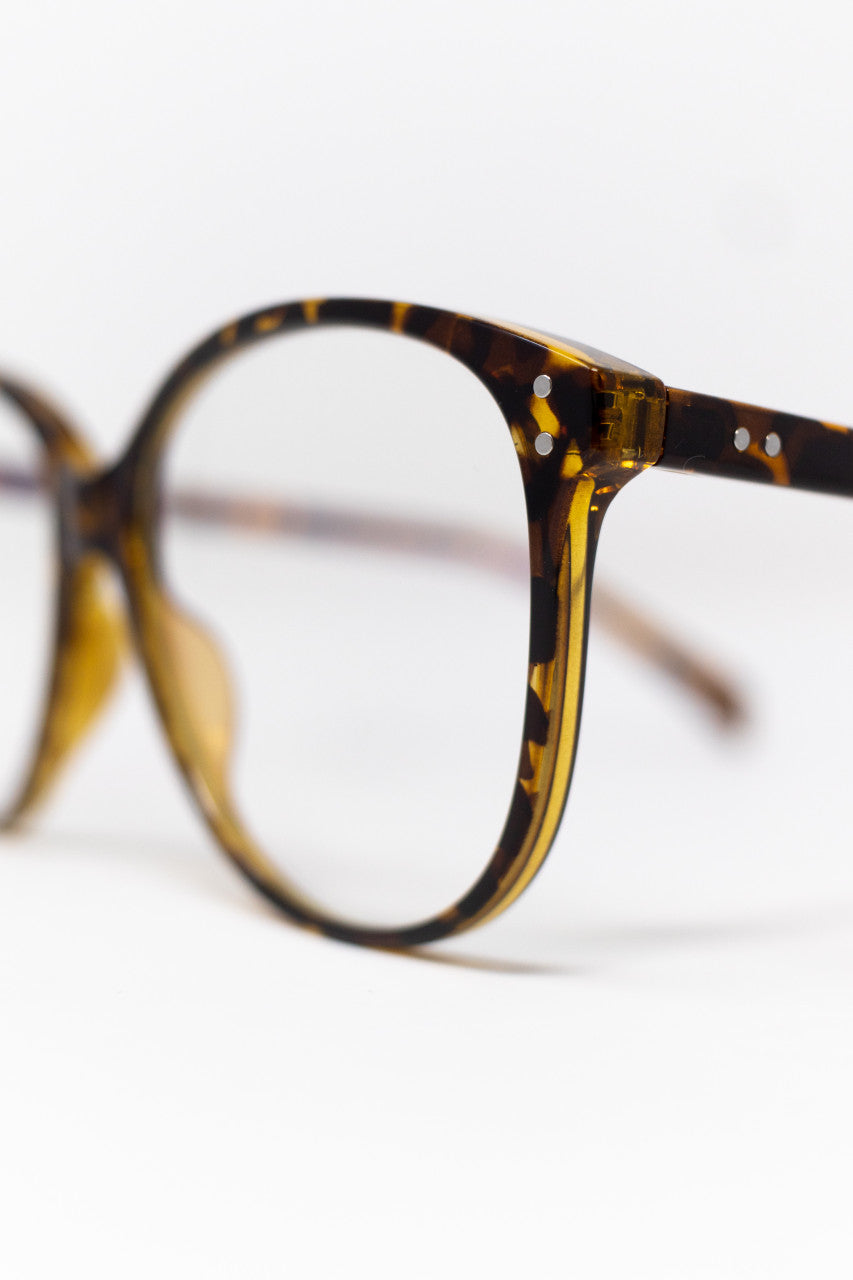 Blue light glasses are designed to filter out damaging blue toned light, emitted from most digital devices driving our lives on the daily. These glasses assist with increased melatonin production, reduced eye fatigue and have a stylish, minimal frame that pairs well with any outfit.