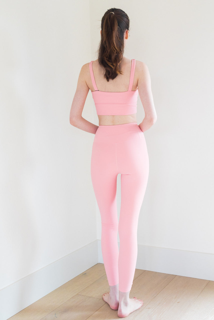 The Royal Ribbed Bra Top in Bubblegum is a stylish and supportive athletic bra top that is perfect for any workout or active lifestyle. It features a grey heather finish, a secure fit, and anti-pill technology, ensuring that it stays looking and feeling great wear after wear.


