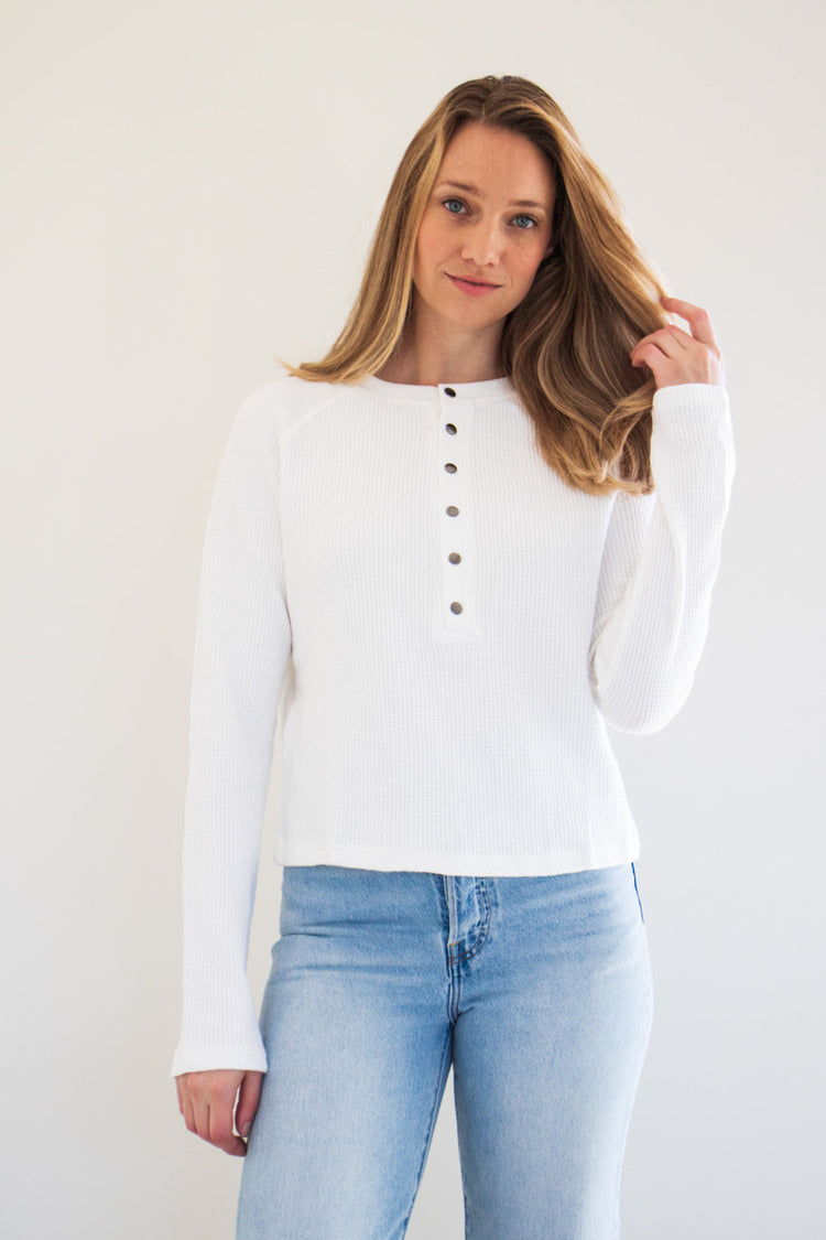 This elevated top features a unique henley button down style, with our signature 100% cotton waffle fabric. Comforting and soft, this boxy long sleeve is the perfect for a casual outfit.

