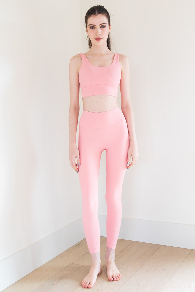 The Ribbed Ultimate Legging in Bubblegum is a high-performance athletic legging that is perfect for any workout or active lifestyle. It features a grey heather finish, a secure fit, and anti-pill technology, ensuring that it stays looking and feeling great wear after wear.

