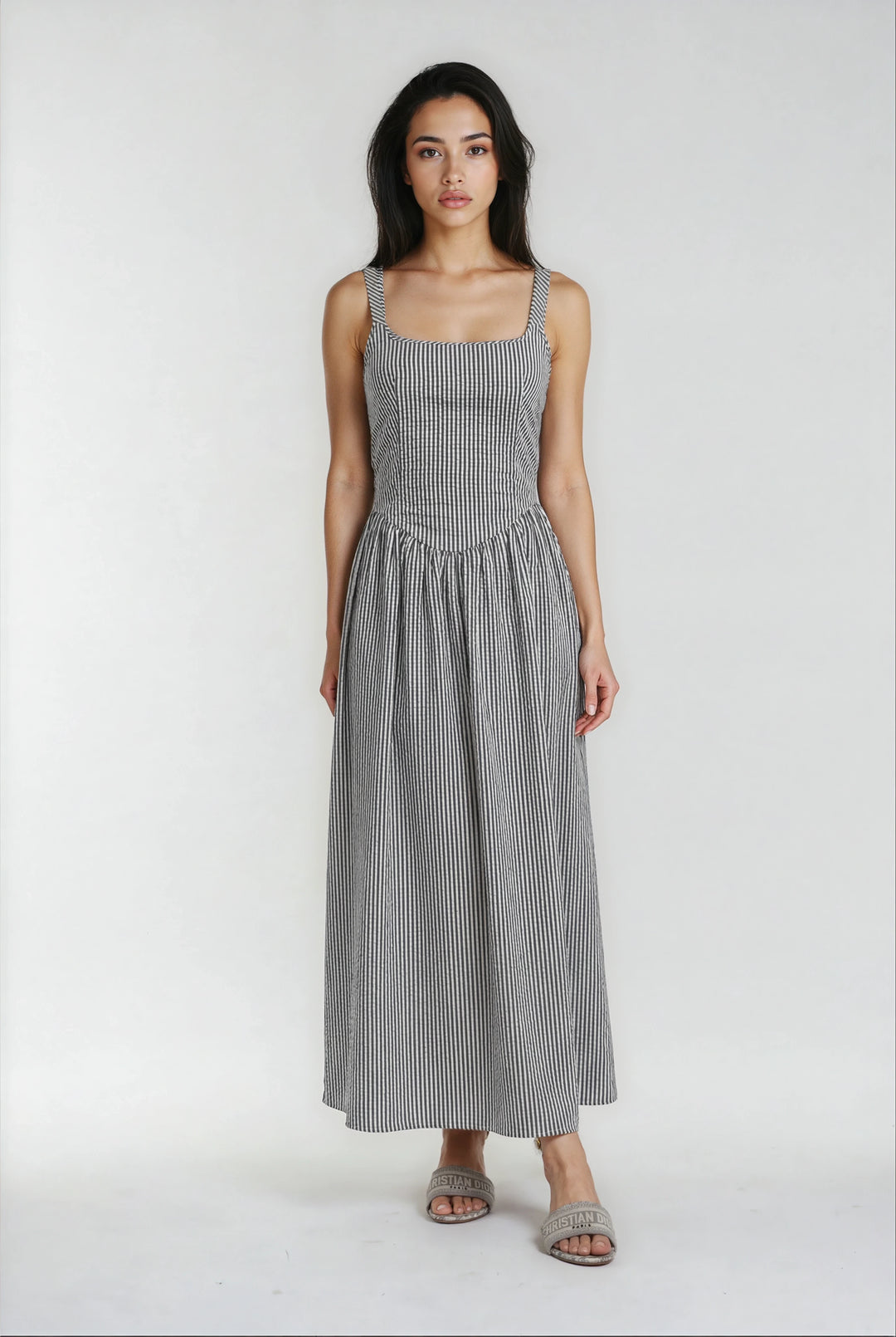 Black and white striped midi dress with tie-back detail
