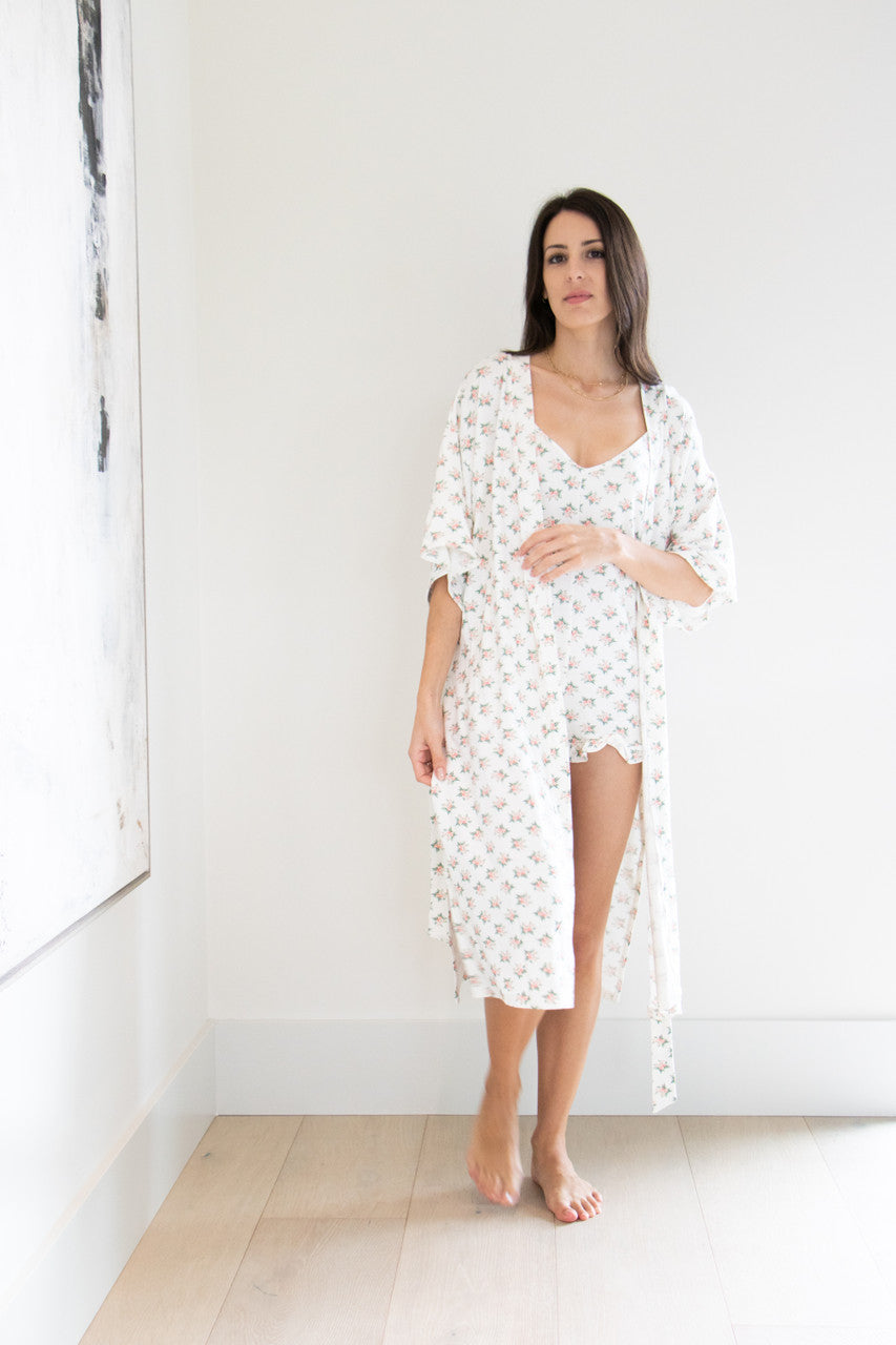 Our Signature Robe has been reimagined in our feminine Rose Print. This full length tie-waist robe is light weight and comforting against the skin, with 3/4 sleeves and a split-hem finish to ensure a free range of motion when tied closed.

