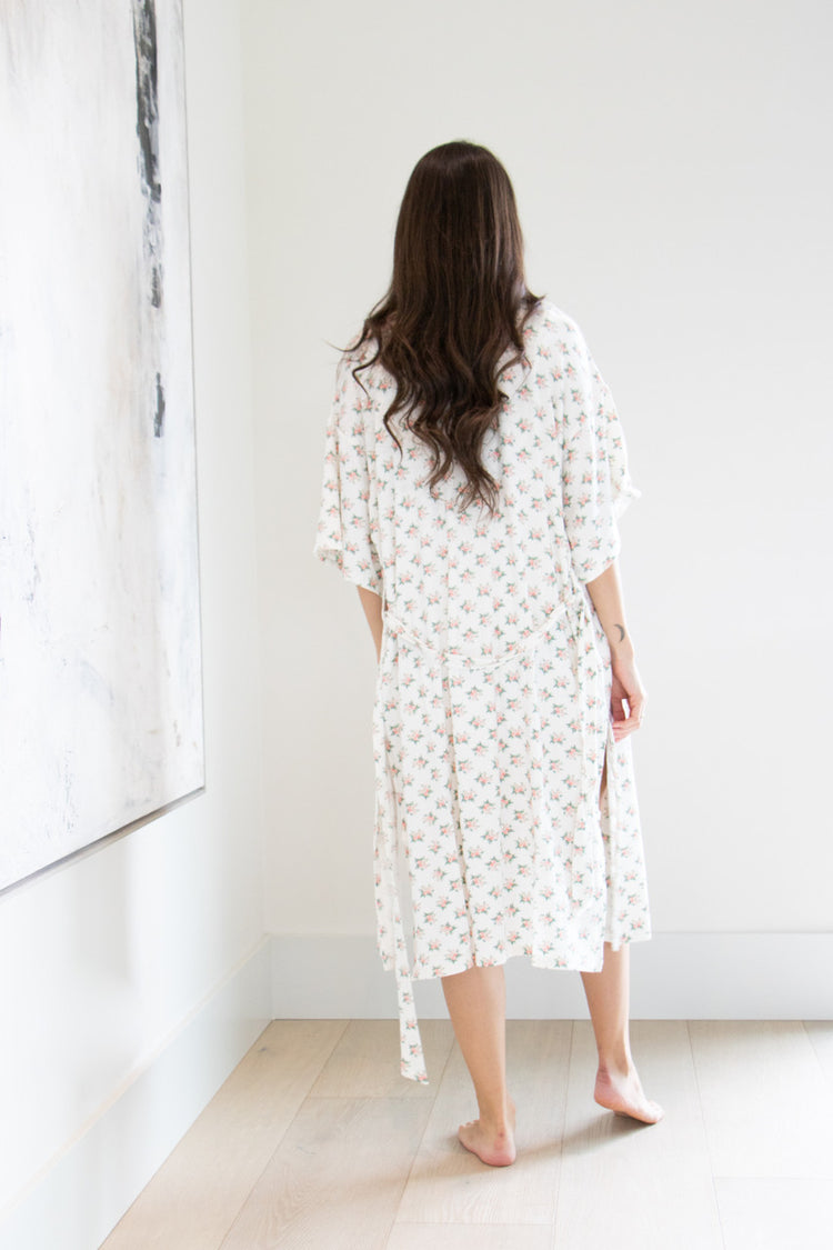 Our Signature Robe has been reimagined in our feminine Rose Print. This full length tie-waist robe is light weight and comforting against the skin, with 3/4 sleeves and a split-hem finish to ensure a free range of motion when tied closed.

