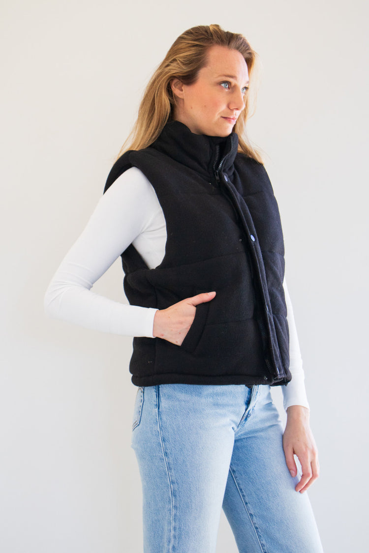Transition into the cold with The Cora Knit Puffer Vest by PARKE Essentials. Featuring plush fabric, a high-neck rise, and slightly cropped fit, this is not your average winter vest. Available in earthy natural tones Grey, Oat Milk, and Black. 

