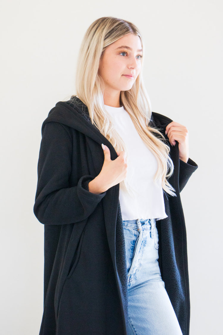 Our luxurious Cloud 9 Cardigan is a custom made full length style with a pocketed cardigan body and reverse fleece hood. Featured in a variety of gentle tones to pair and wear with any of your favourite seasonal pieces - or for lounging in the ultimate comfort at home.