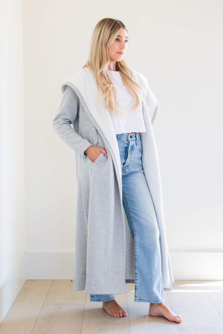 Our luxurious Cloud 9 Cardigan is a custom made full length style with a pocketed cardigan body and reverse fleece hood. Featured in a variety of gentle tones to pair and wear with any of your favourite seasonal pieces - or for lounging in the ultimate comfort at home.