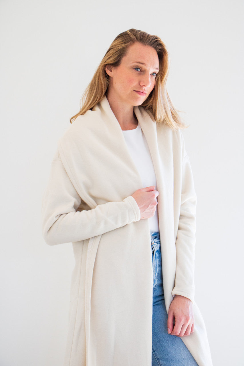 Our Coco Cozy Coatigan is a lifestyle piece designed to keep you pampered in warmth, softness and comfort. Embracing you with rich fabrics and amazing hand-feel, this long lounger Coatigan is the blanket you truly can wear all day without taking off. 

