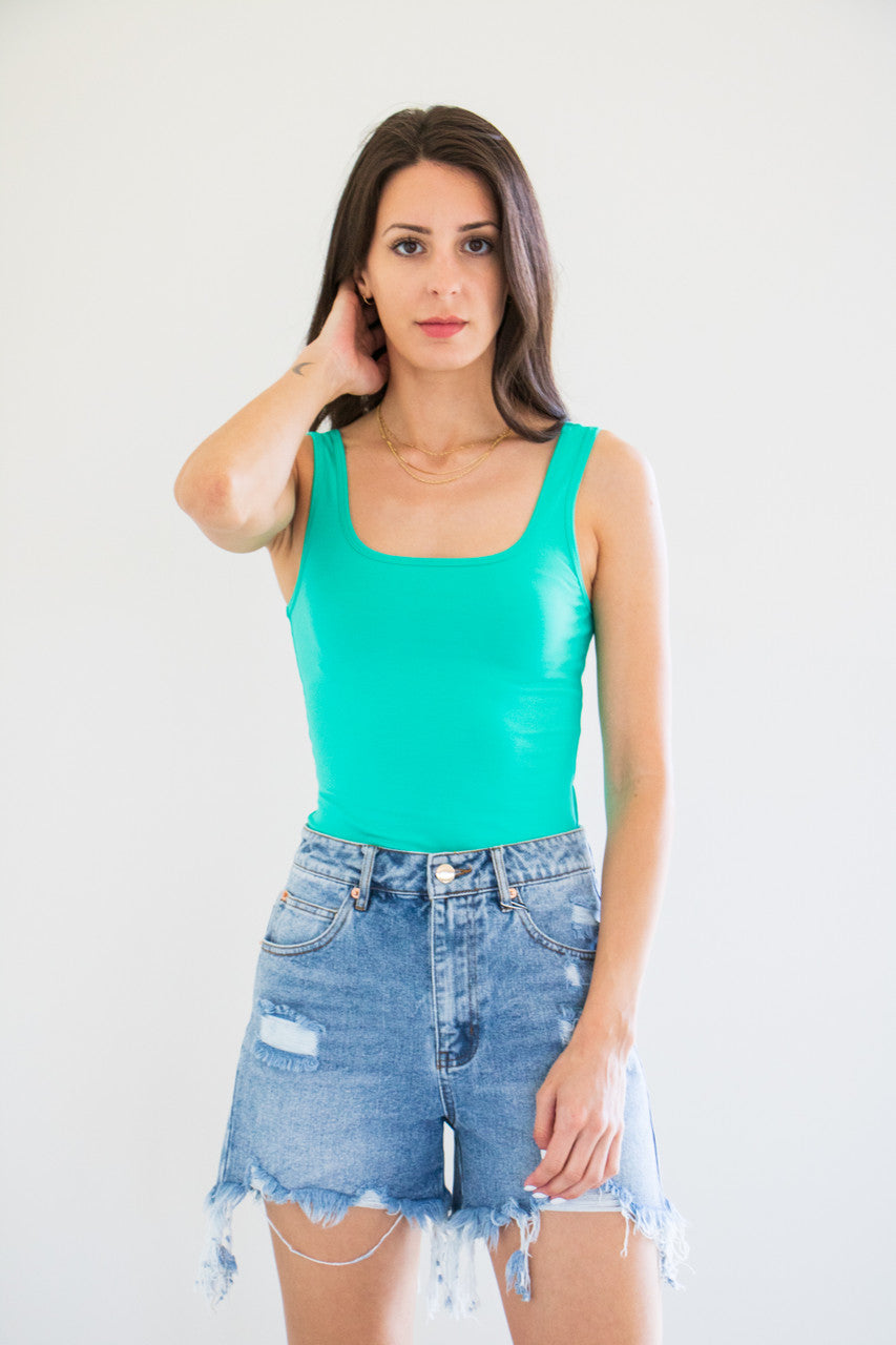 An essential bodysuit with a close fit and lightweight fabric, Hannah features a bold green seasonal finish with a square cut neckline and just a little bit of stretch. Pair and wear with anything, quickly and effortlessly.

