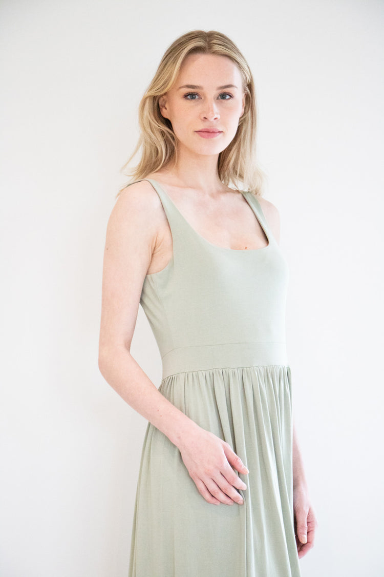 Our best selling summer dress is back in five seasonal colours. Made with a flattering silhouette and scooped neckline, the perfect amount of stretch and a side split to mid thigh. Viscose based fabric has a soft, flowing quality - easy to wear casually and effortless to elevate for something more formal. 
