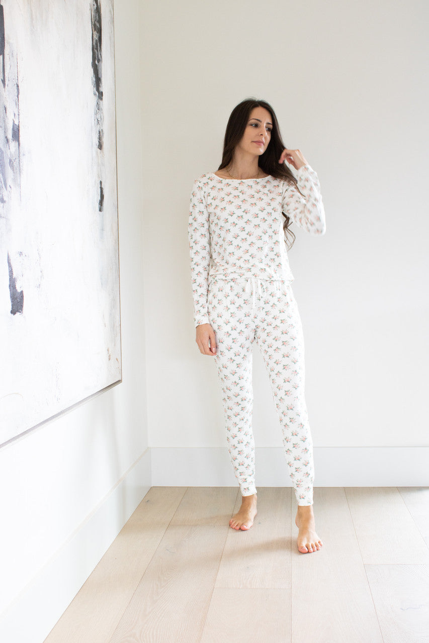 Our best-selling style in our sleepwear apparel collection, the Wildest Dreams Sleep Set is made from our luxurious and comfortable signature sleep fabric and finished in a feminine rose print.  The set features a long sleeve boxy pullover crew and tapered ankle length pant with an elasticated cinch waist. 

