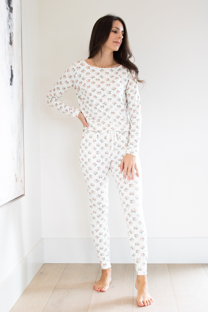 Our best-selling style in our sleepwear apparel collection, the Wildest Dreams Sleep Set is made from our luxurious and comfortable signature sleep fabric and finished in a feminine rose print.  The set features a long sleeve boxy pullover crew and tapered ankle length pant with an elasticated cinch waist. 

