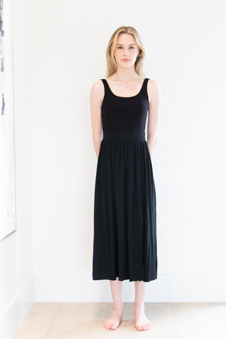 Made with a flattering silhouette and scooped neckline, ribbed chest fabric, the perfect amount of stretch and a side split to mid thigh. Viscose based fabric has a soft, flowing quality - easy to wear casually and effortless to elevate for something more formal. 
