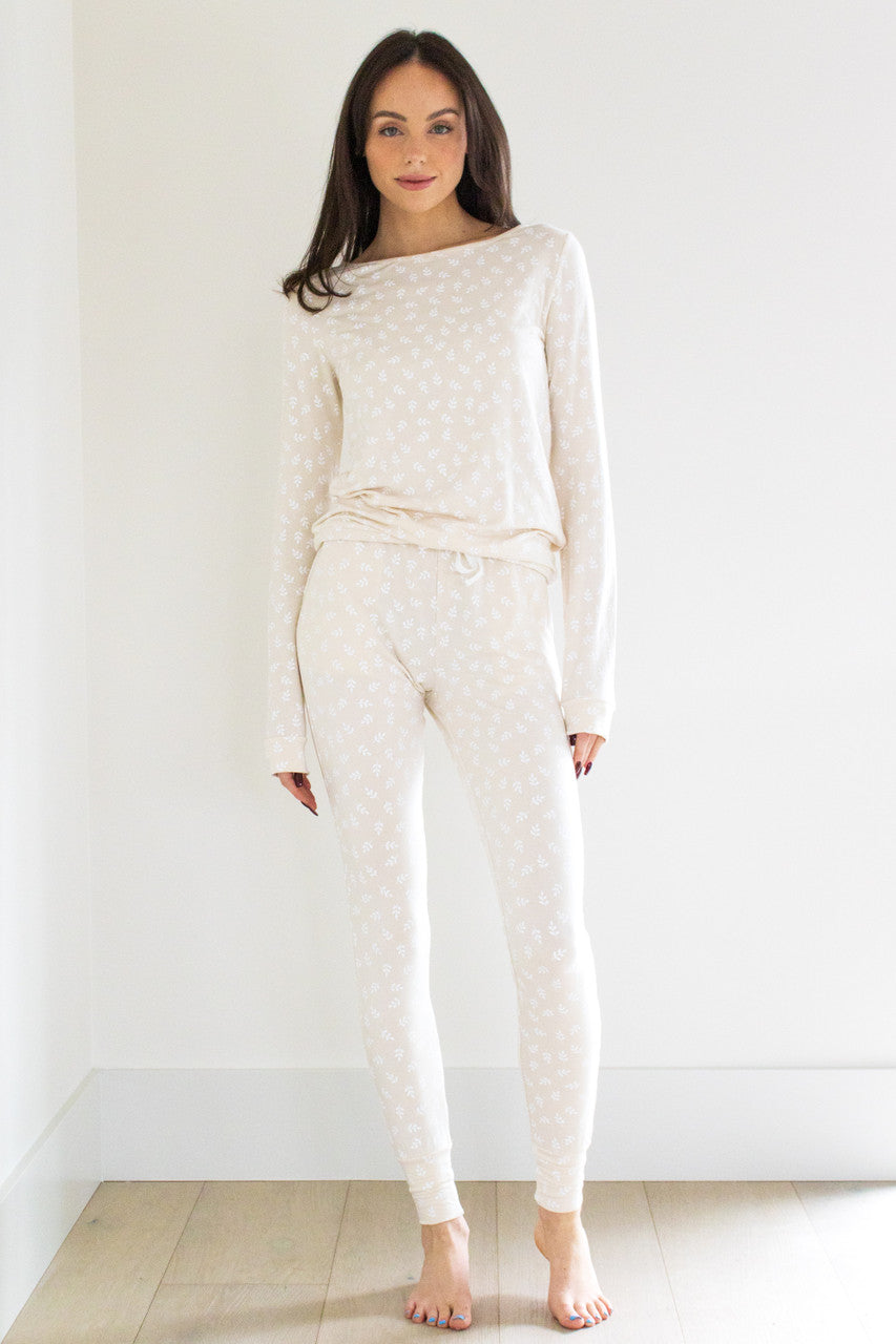 Our best-selling style in our sleepwear apparel collection, the Wildest Dreams Sleep Set is made from our luxurious and comfortable signature sleep fabric. We're keeping it classic with this neutral colour-tone.  The set features a long sleeve boxy pullover crew and tapered ankle length pant with an elasticated cinch waist with an oat print finish.

