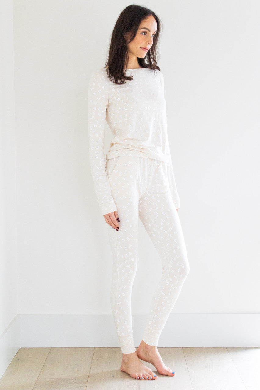 Our best-selling style in our sleepwear apparel collection, the Wildest Dreams Sleep Set is made from our luxurious and comfortable signature sleep fabric. We're keeping it classic with this neutral colour-tone.  The set features a long sleeve boxy pullover crew and tapered ankle length pant with an elasticated cinch waist with an oat print finish.

