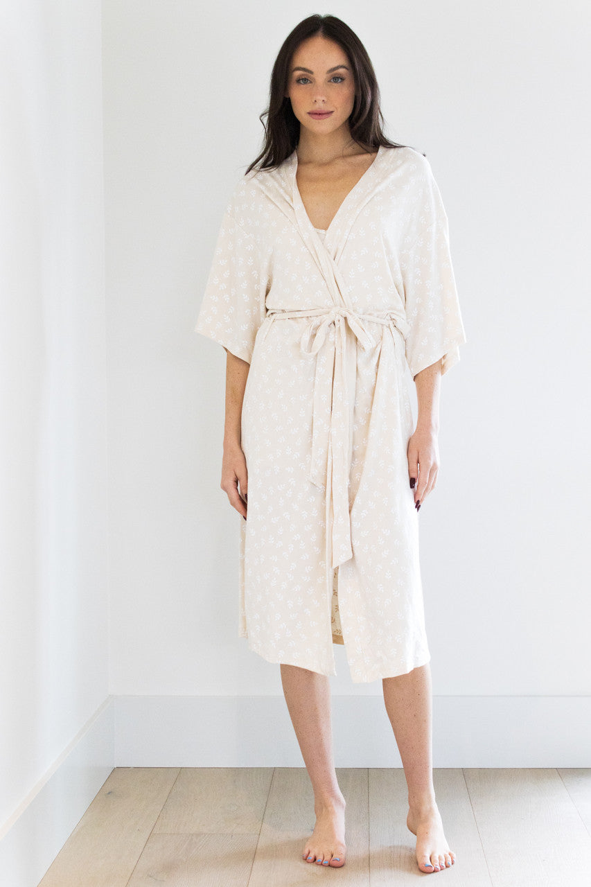 Our Signature Robe has been reimagined in our Country Oat Print. This full length tie-waist robe is light weight and comforting against the skin, with 3/4 sleeves and a split-hem finish to ensure a free range of motion when tied closed.

