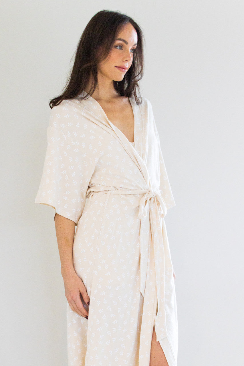 Our Signature Robe has been reimagined in our Country Oat Print. This full length tie-waist robe is light weight and comforting against the skin, with 3/4 sleeves and a split-hem finish to ensure a free range of motion when tied closed.

