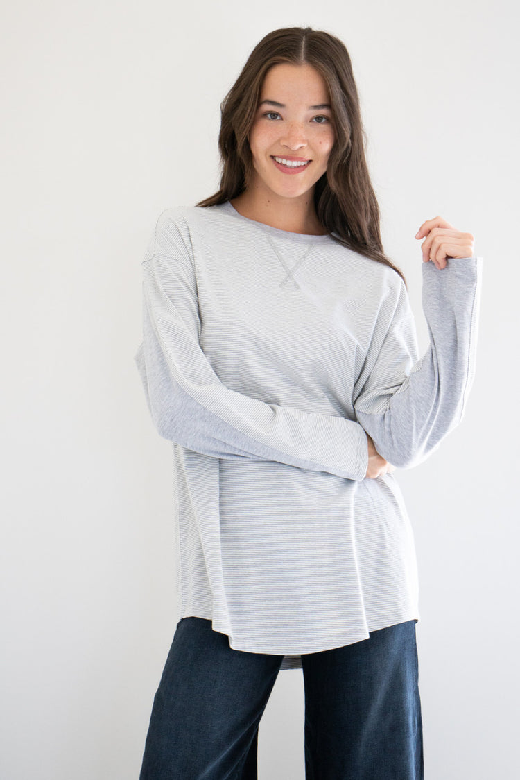 No exaggeration here; this is the ultimate long sleeve tee. Fitting loose on your frame with a drop-shoulder design and a gentle curve at the hem, this essential piece is effortless to pair and wear, with simple care instructions and understated details throughout. Monikered with the PRIV seal between the shoulder-blades. 

