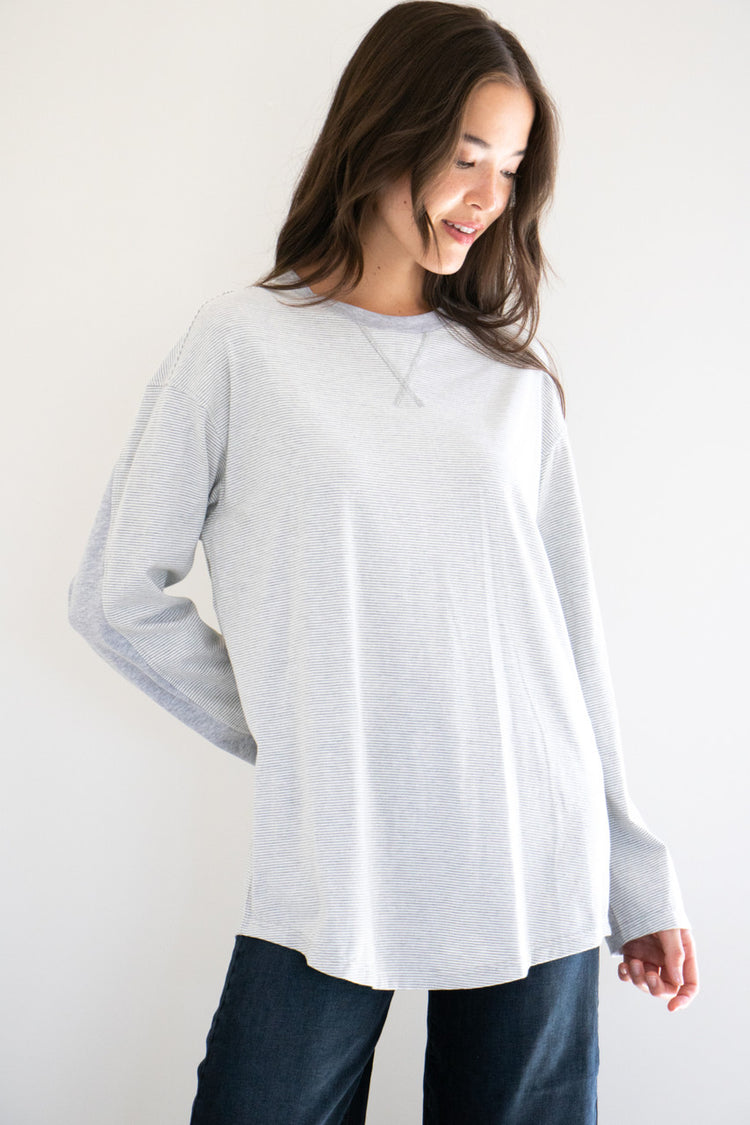 No exaggeration here; this is the ultimate long sleeve tee. Fitting loose on your frame with a drop-shoulder design and a gentle curve at the hem, this essential piece is effortless to pair and wear, with simple care instructions and understated details throughout. Monikered with the PRIV seal between the shoulder-blades. 

