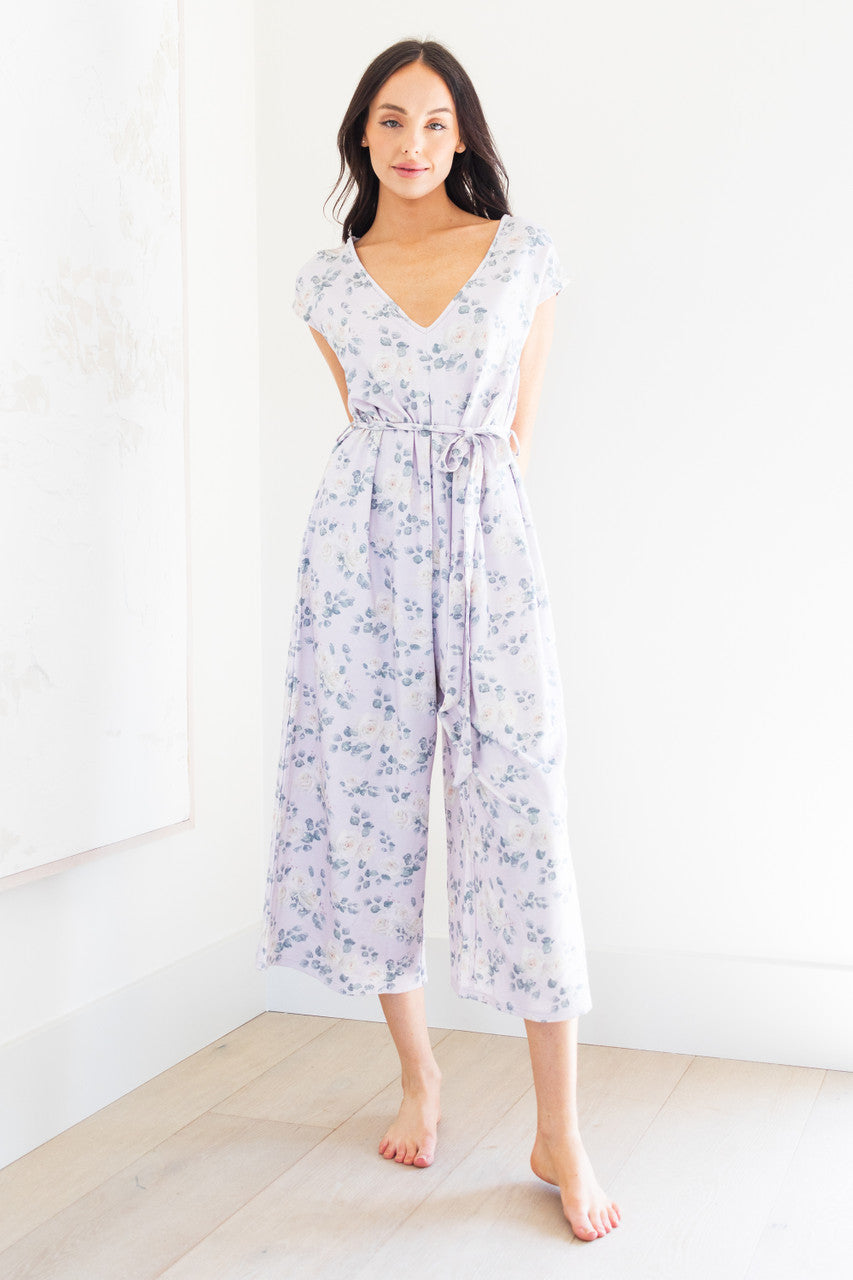 Introducing our white rose print women's romper, made from soft lilac modal fabric. Featuring a tie waist and delicate floral pattern, this romper is both comfortable and stylish. Perfect for any occasion, dress it up or down for a versatile addition to your wardrobe. 
