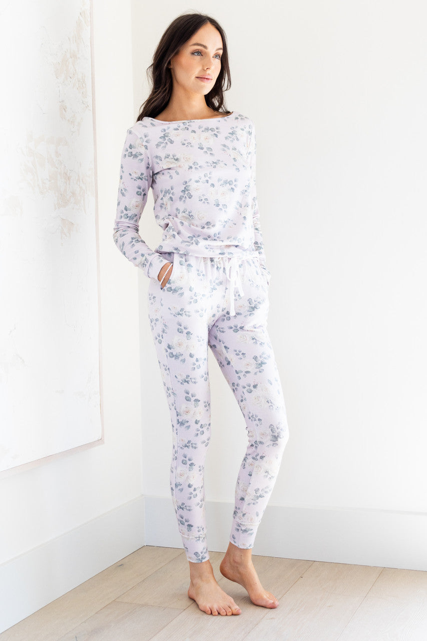 Our best-selling style in our sleepwear apparel collection, the Wildest Dreams Sleep Set is made from our luxurious and comfortable signature sleep fabric. We're bringing our gorgeous new white rose print to our fave set.  The set features a long sleeve boxy pullover crew and tapered ankle length pant with an elasticated cinch waist. 
