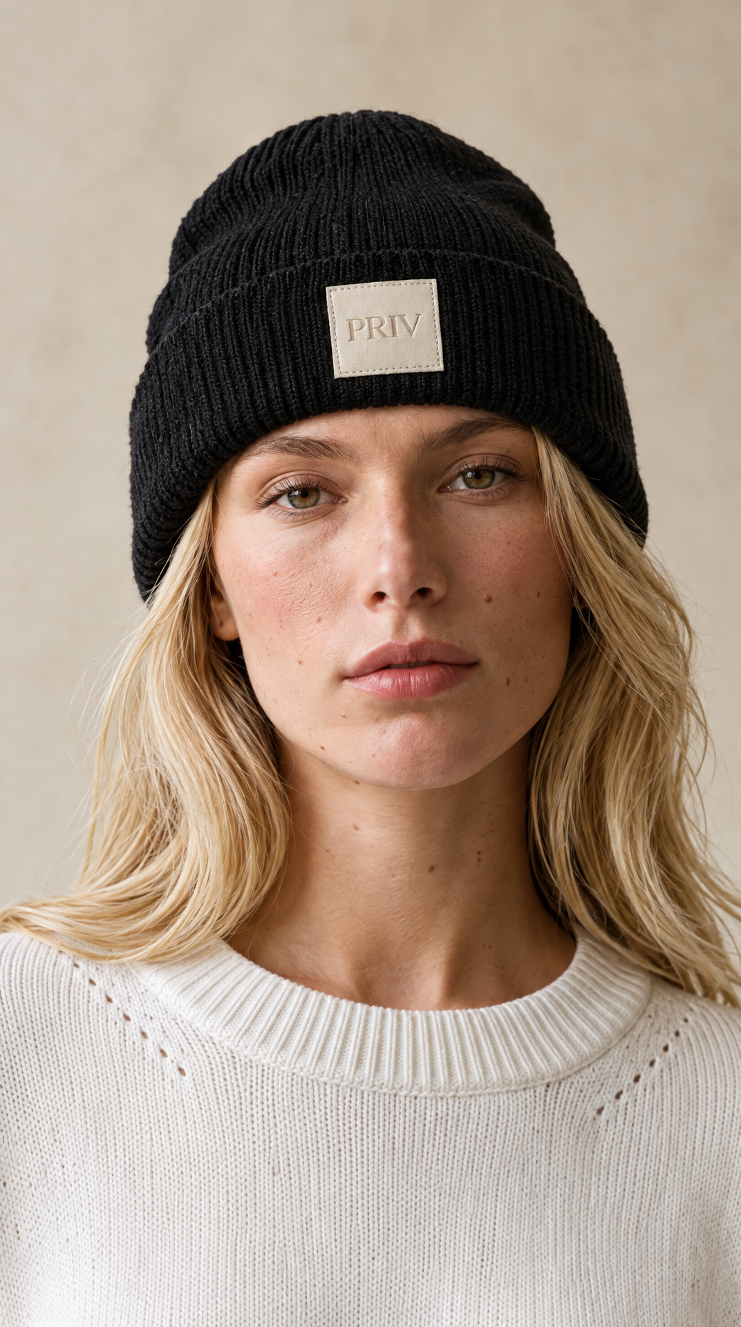 PRIV Moniker toque black worn – close-up of rib knit and PRIV patch – PRIV the Brand