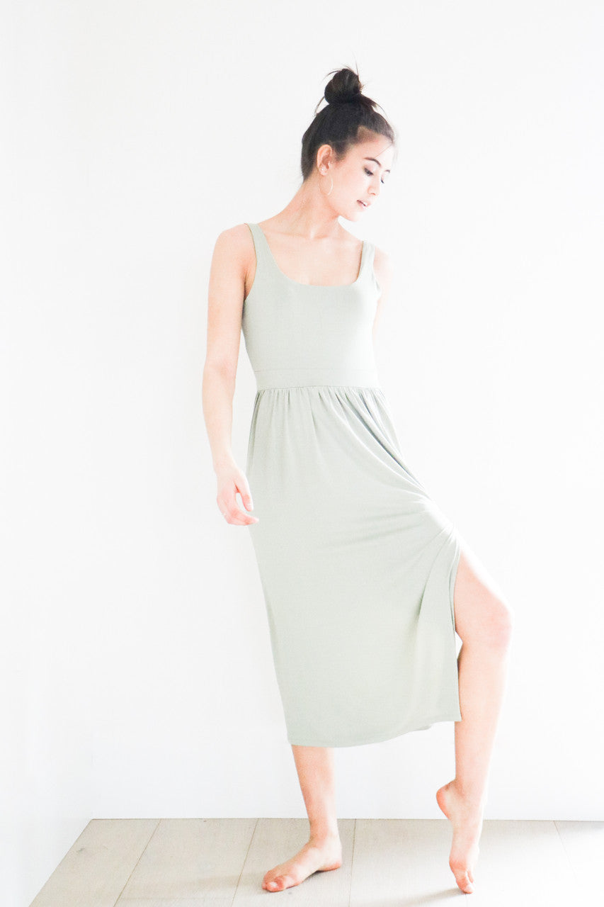 Our best selling summer dress is back in five seasonal colours. Made with a flattering silhouette and scooped neckline, the perfect amount of stretch and a side split to mid thigh. Viscose based fabric has a soft, flowing quality - easy to wear casually and effortless to elevate for something more formal. 
