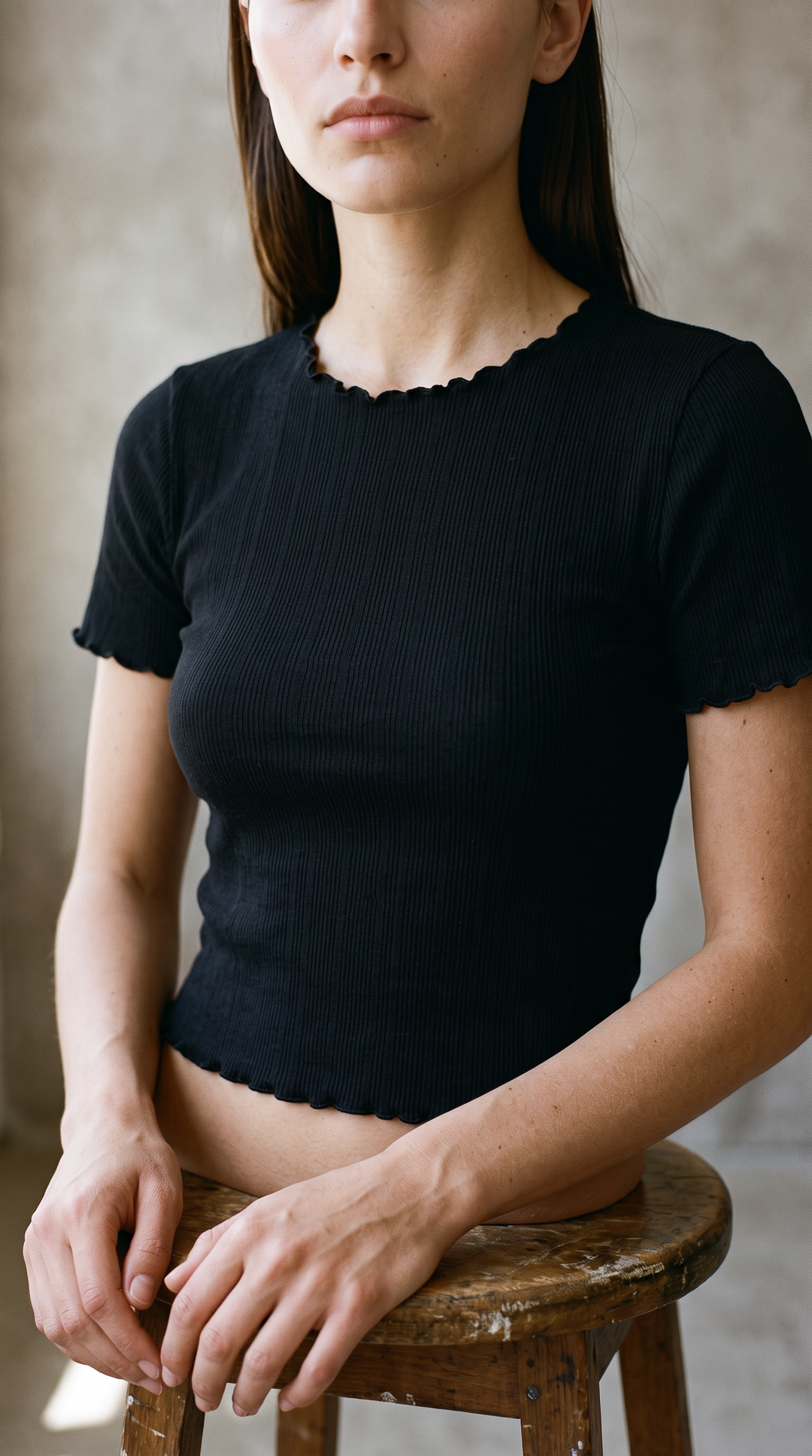 Chrissy - Ruffle Hem Ribbed Cotton Feminine T-Shirt In Black